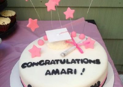 Pink And White Graduation Cake
